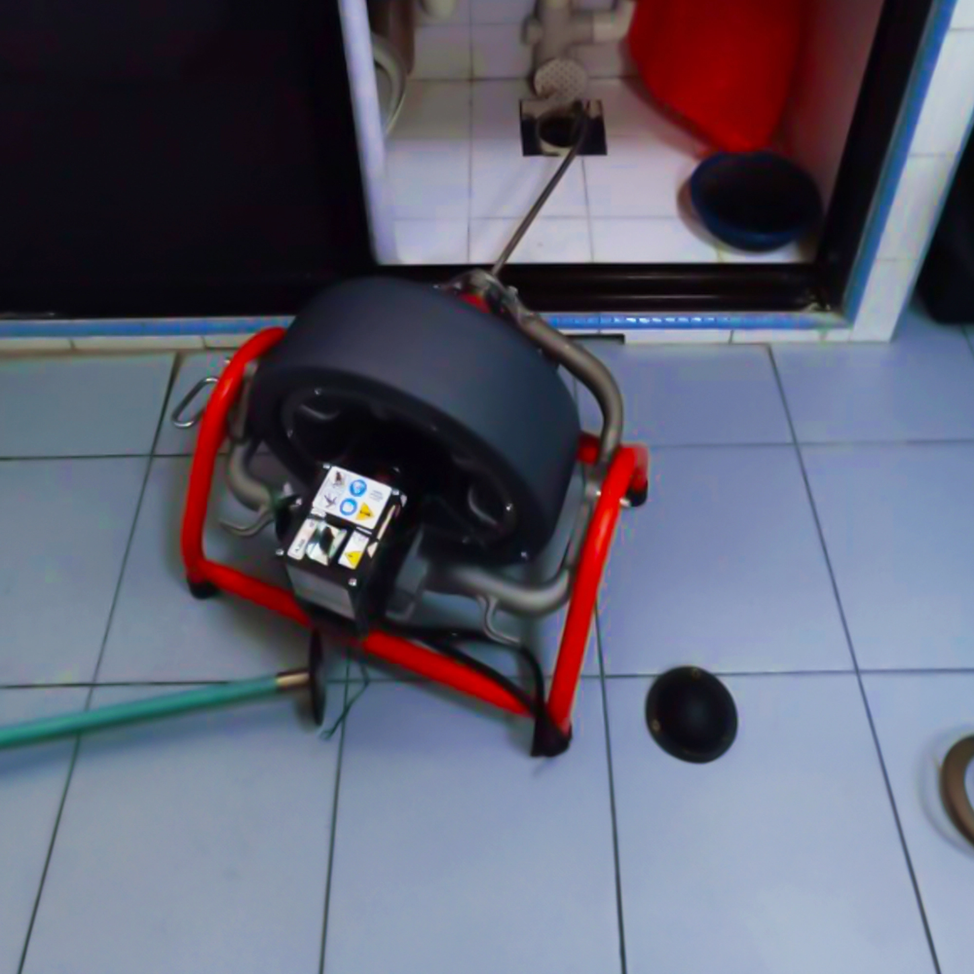 Specialist equipment to unclog kitchen floor trap